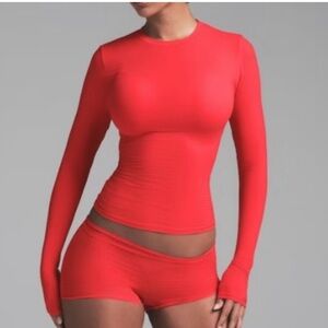 SKIMS fits everyone long sleeve shirt. Size L poppy.